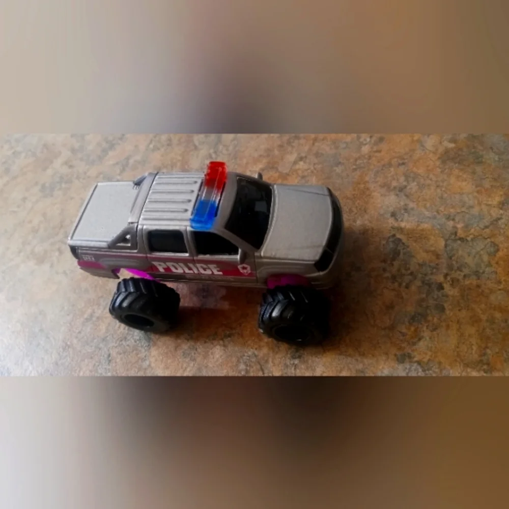 Silver Police Monster Truck Toy with Red & Blue Light Bar